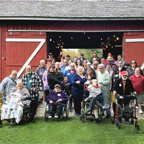 Attendees posing at ARC's annual Duffy Family Farm Picnic