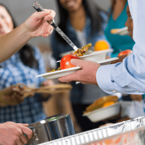 those in need going through a food line for a free meal